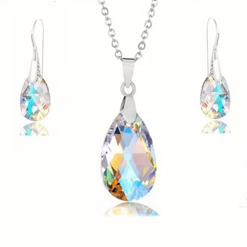 Fashionable New Jewelry Set Featuring Colorful Crystal Drop Earrings And a Pendant Necklace.