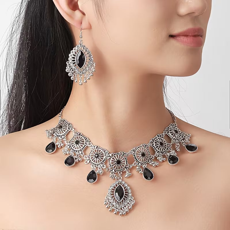 A Vintage Hollow Drop Tassel Jewelry Set Featuring an Exaggerated Necklace And Earrings with a Middle Eastern Ethnic Style in Western Fashion