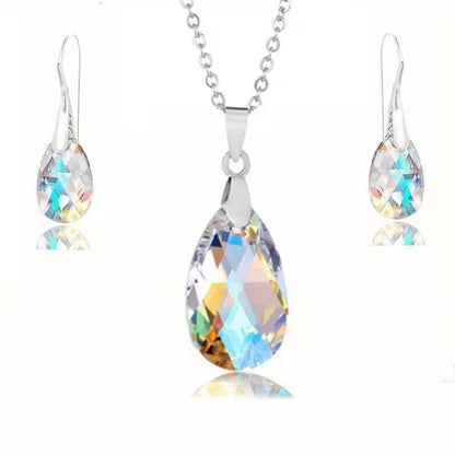 Fashionable New Jewelry Set Featuring Colorful Crystal Drop Earrings And a Pendant Necklace.