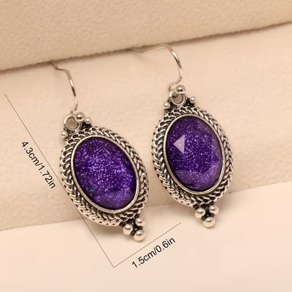 A Pair of Alloy Earrings Inlaid with Purple Oval Resin