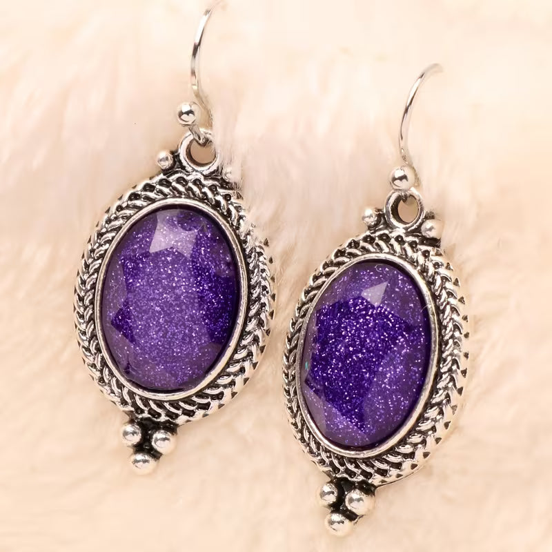 A Pair of Alloy Earrings Inlaid with Purple Oval Resin