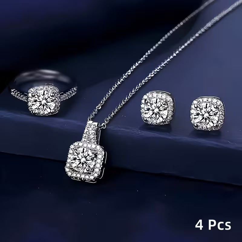 A Set of 4 Sparkling Cubic Zirconia Jewelry Pieces! This Combination Includes a Necklace Pendant, Ring, And Earrings, Showcasing Exquisite Cuts That Radiate Brilliance. It'S Stylish And Versatile, Perfect for Various Occasions