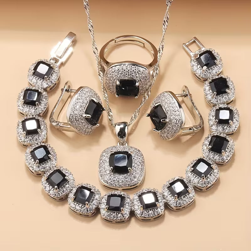 A Newly Designed Square Zirconia Fashion Jewelry Set for Women, Including Earrings, a Necklace with a Pendant, a Bracelet, And an Adjustable Ring Suitable for Various Occasions