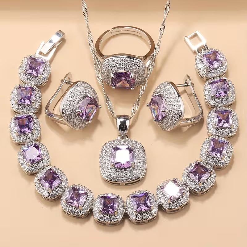 A Newly Designed Square Zirconia Fashion Jewelry Set for Women, Including Earrings, a Necklace with a Pendant, a Bracelet, And an Adjustable Ring Suitable for Various Occasions