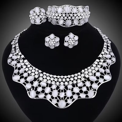 Elegant Jewelry Collection for Women Featuring Faux Cat'S Eye, Rhinestones, And a Golden Necklace, Earrings, Bangle, And Ring, Perfect for Banquets And Proms