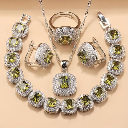 A Newly Designed Square Zirconia Fashion Jewelry Set for Women, Including Earrings, a Necklace with a Pendant, a Bracelet, And an Adjustable Ring Suitable for Various Occasions