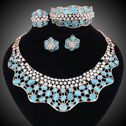 Elegant Jewelry Collection for Women Featuring Faux Cat'S Eye, Rhinestones, And a Golden Necklace, Earrings, Bangle, And Ring, Perfect for Banquets And Proms