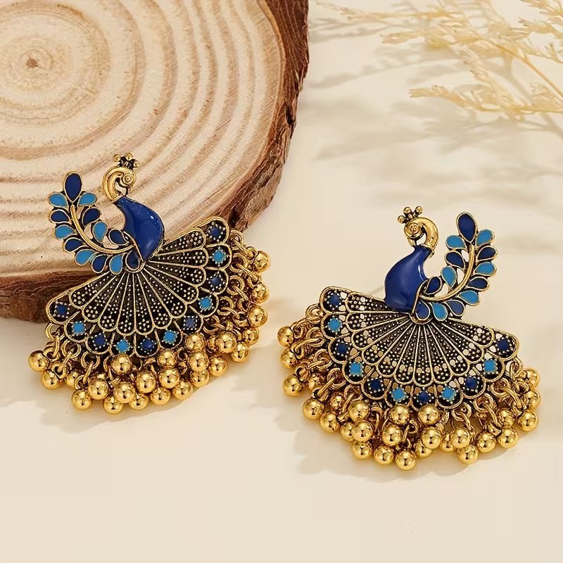 A Pair of Jhumka Peacock Earrings with Bells And Tassels, Stylish And Vintage Additions Suitable for Women to Wear Daily, During Festivals, Weddings, And Parties, Or As Jewelry Gifts