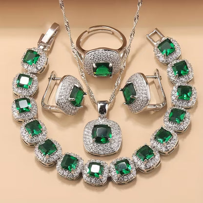 A Newly Designed Square Zirconia Fashion Jewelry Set for Women, Including Earrings, a Necklace with a Pendant, a Bracelet, And an Adjustable Ring Suitable for Various Occasions