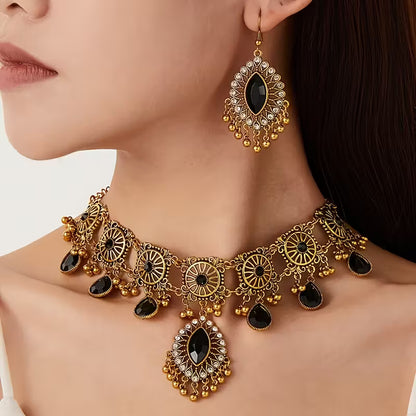 A Vintage Hollow Drop Tassel Jewelry Set Featuring an Exaggerated Necklace And Earrings with a Middle Eastern Ethnic Style in Western Fashion