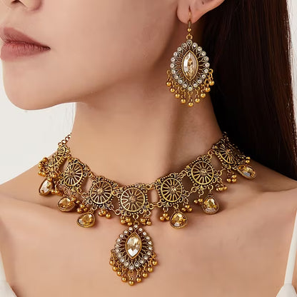 A Vintage Hollow Drop Tassel Jewelry Set Featuring an Exaggerated Necklace And Earrings with a Middle Eastern Ethnic Style in Western Fashion