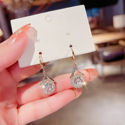 A Pair of Elegant Synthetic Zirconia Pendant Earrings Suitable for Weddings, Parties, And Everyday Wear