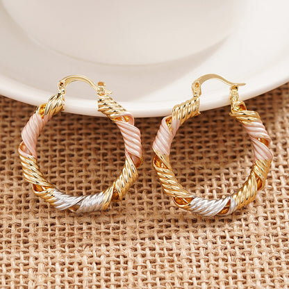 Korean-style Gentle Spiral Hollow Three-color Earrings For Women