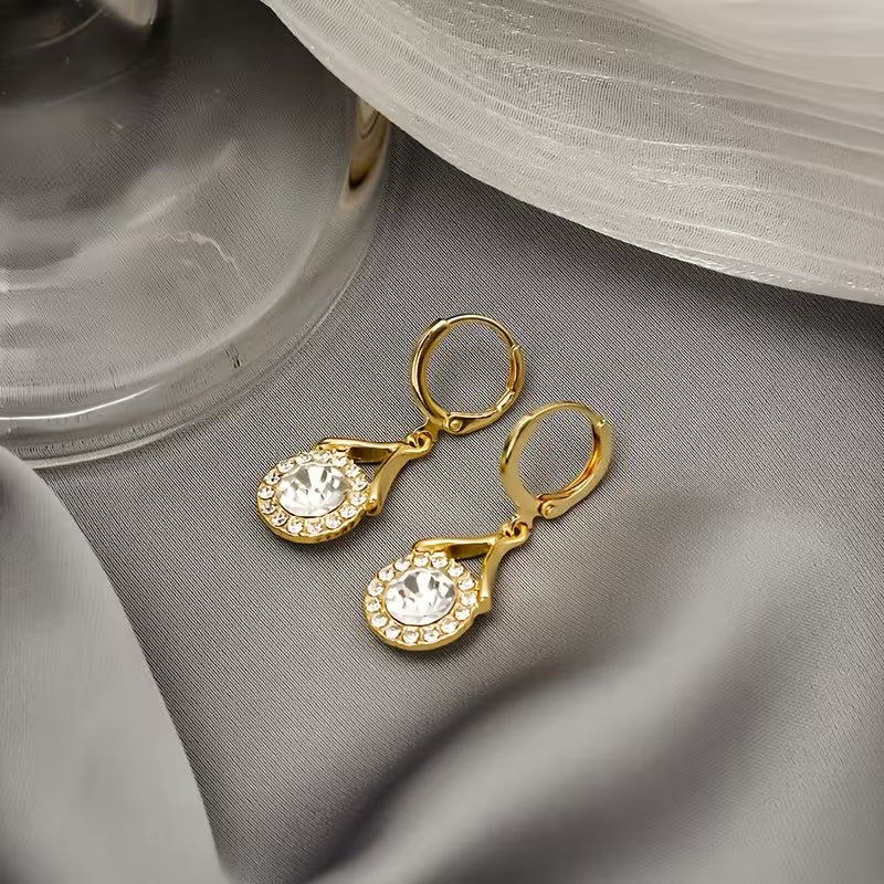 A Pair of Elegant Synthetic Zirconia Pendant Earrings Suitable for Weddings, Parties, And Everyday Wear