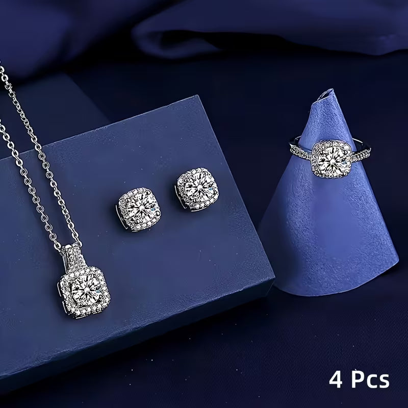 A Set of 4 Sparkling Cubic Zirconia Jewelry Pieces! This Combination Includes a Necklace Pendant, Ring, And Earrings, Showcasing Exquisite Cuts That Radiate Brilliance. It'S Stylish And Versatile, Perfect for Various Occasions