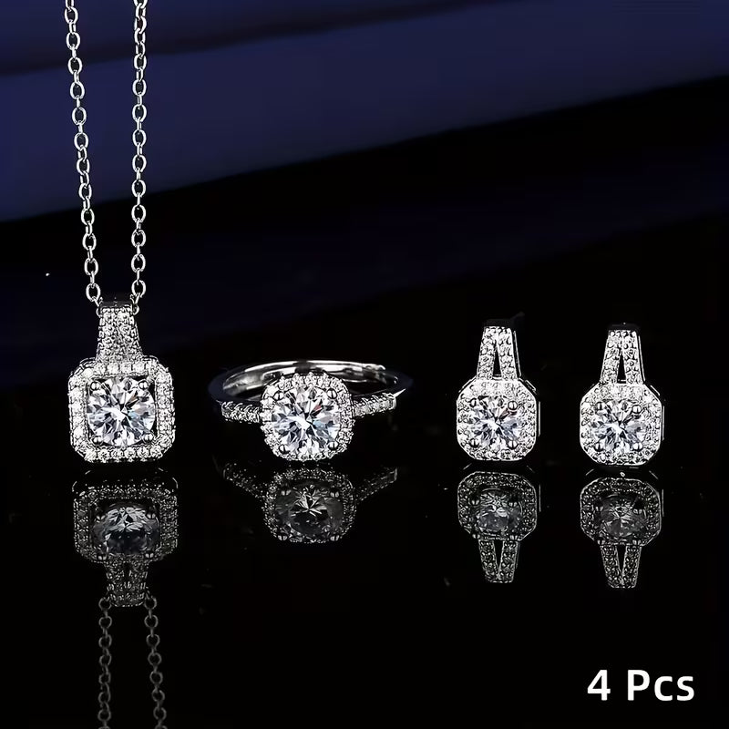 A Set of 4 Sparkling Cubic Zirconia Jewelry Pieces! This Combination Includes a Necklace Pendant, Ring, And Earrings, Showcasing Exquisite Cuts That Radiate Brilliance. It'S Stylish And Versatile, Perfect for Various Occasions