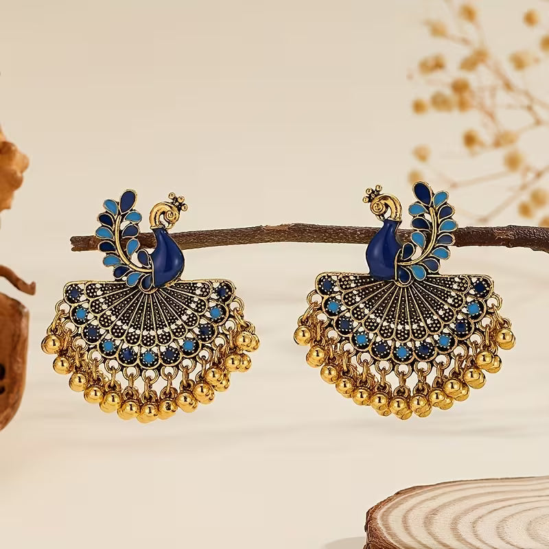 A Pair of Jhumka Peacock Earrings with Bells And Tassels, Stylish And Vintage Additions Suitable for Women to Wear Daily, During Festivals, Weddings, And Parties, Or As Jewelry Gifts