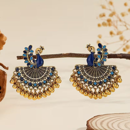 A Pair of Jhumka Peacock Earrings with Bells And Tassels, Stylish And Vintage Additions Suitable for Women to Wear Daily, During Festivals, Weddings, And Parties, Or As Jewelry Gifts