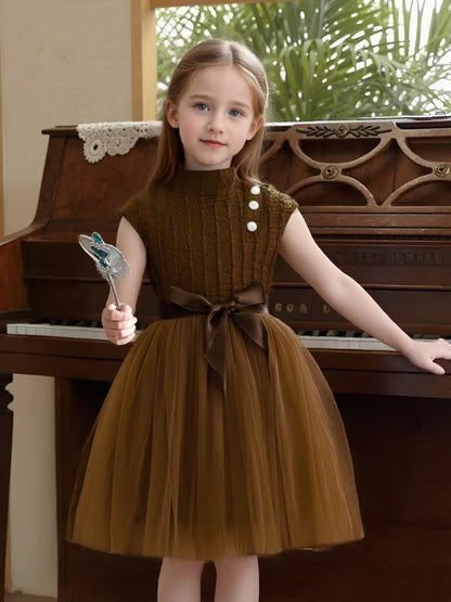 A Romantic And Elegant Sleeveless Dress with a Half-High Collar, Pearl Buttons, And a Mesh Belt, Perfect for Outdoor Casual Wear And Parties
