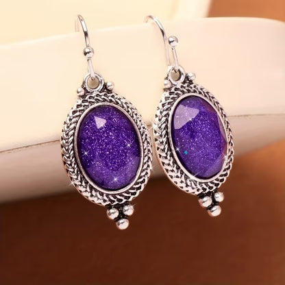 A Pair of Alloy Earrings Inlaid with Purple Oval Resin