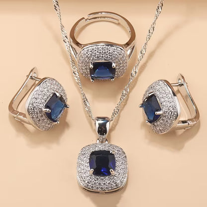 A Luxurious Jewelry Set Featuring Elegant And Classic Additions for Brides And Bridesmaids, Including High-Quality Cubic Zirconia Square Earrings, a Necklace, a Pendant, And an Adjustable Ring