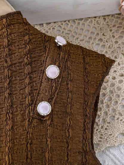 A Romantic And Elegant Sleeveless Dress with a Half-High Collar, Pearl Buttons, And a Mesh Belt, Perfect for Outdoor Casual Wear And Parties