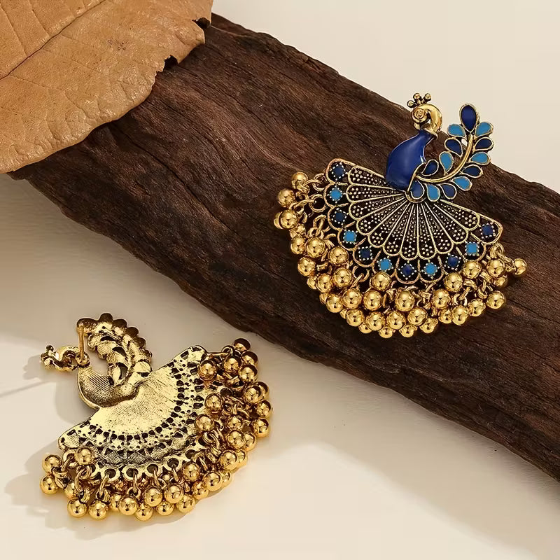 A Pair of Jhumka Peacock Earrings with Bells And Tassels, Stylish And Vintage Additions Suitable for Women to Wear Daily, During Festivals, Weddings, And Parties, Or As Jewelry Gifts