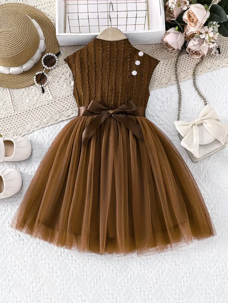 A Romantic And Elegant Sleeveless Dress with a Half-High Collar, Pearl Buttons, And a Mesh Belt, Perfect for Outdoor Casual Wear And Parties