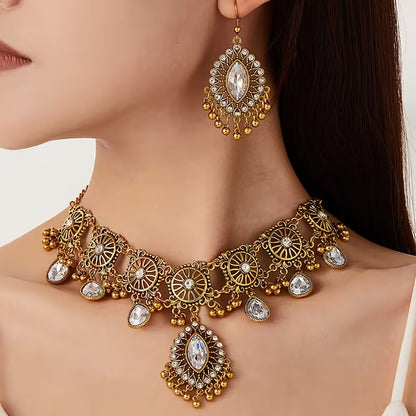 A Vintage Hollow Drop Tassel Jewelry Set Featuring an Exaggerated Necklace And Earrings with a Middle Eastern Ethnic Style in Western Fashion