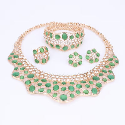 Elegant Jewelry Collection for Women Featuring Faux Cat'S Eye, Rhinestones, And a Golden Necklace, Earrings, Bangle, And Ring, Perfect for Banquets And Proms