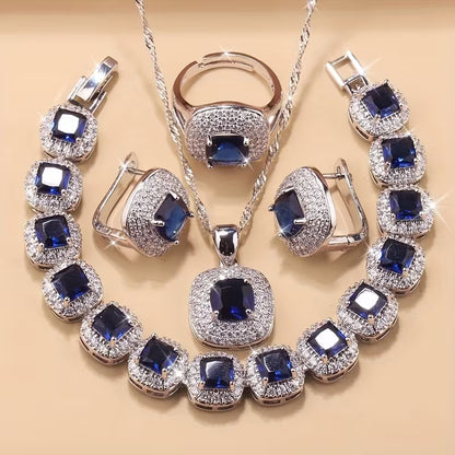 A Newly Designed Square Zirconia Fashion Jewelry Set for Women, Including Earrings, a Necklace with a Pendant, a Bracelet, And an Adjustable Ring Suitable for Various Occasions